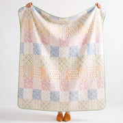 full view sunday patchwork muslin blanket rainbow patchwork green sage trim