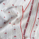 garden patch jacquard throw blanket cherry bud folded stripe detail