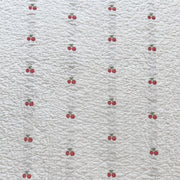 garden patch jacquard throw blanket cherry bud red cherry swatch