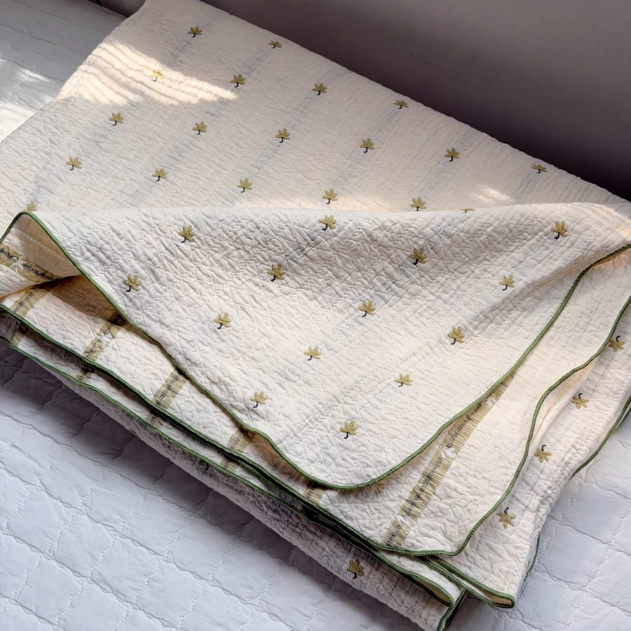 garden patch jacquard throw blanket maple green folded green stripe back