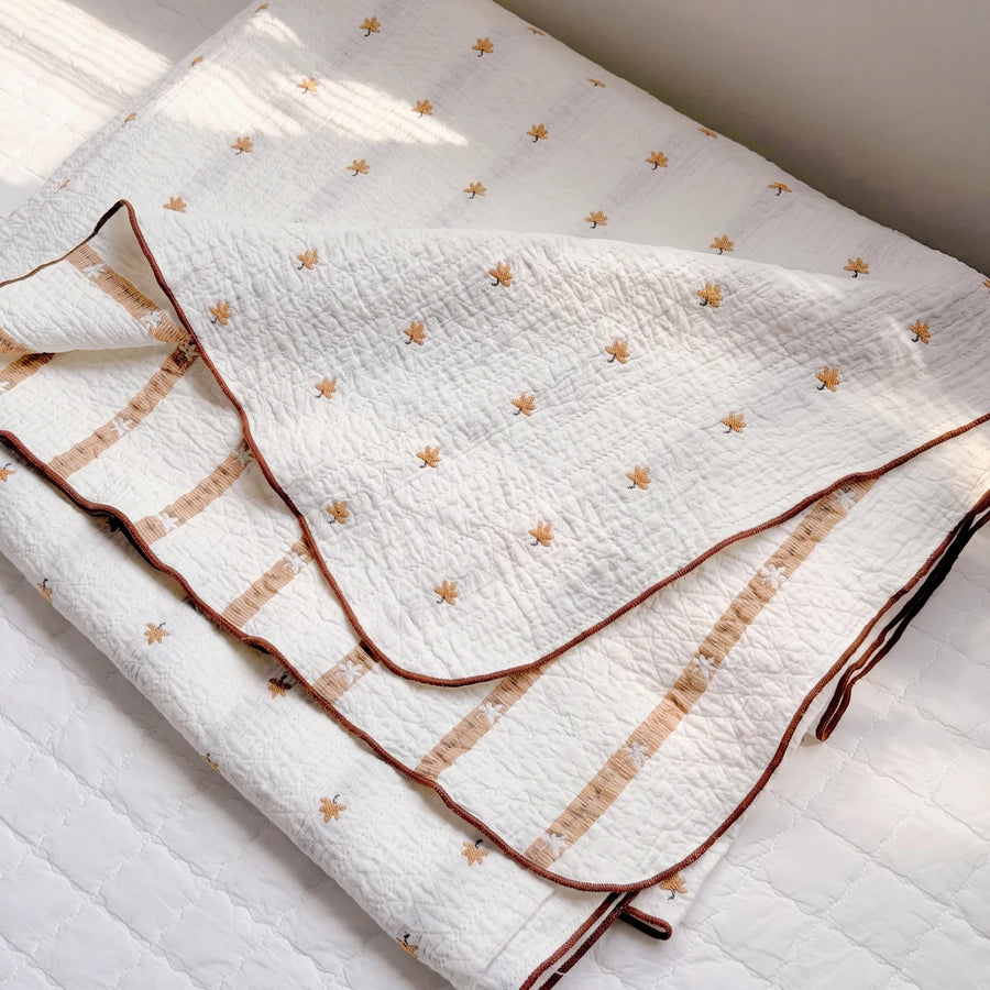 garden patch jacquard throw blanket maple khaki folded brown edge stripe detail