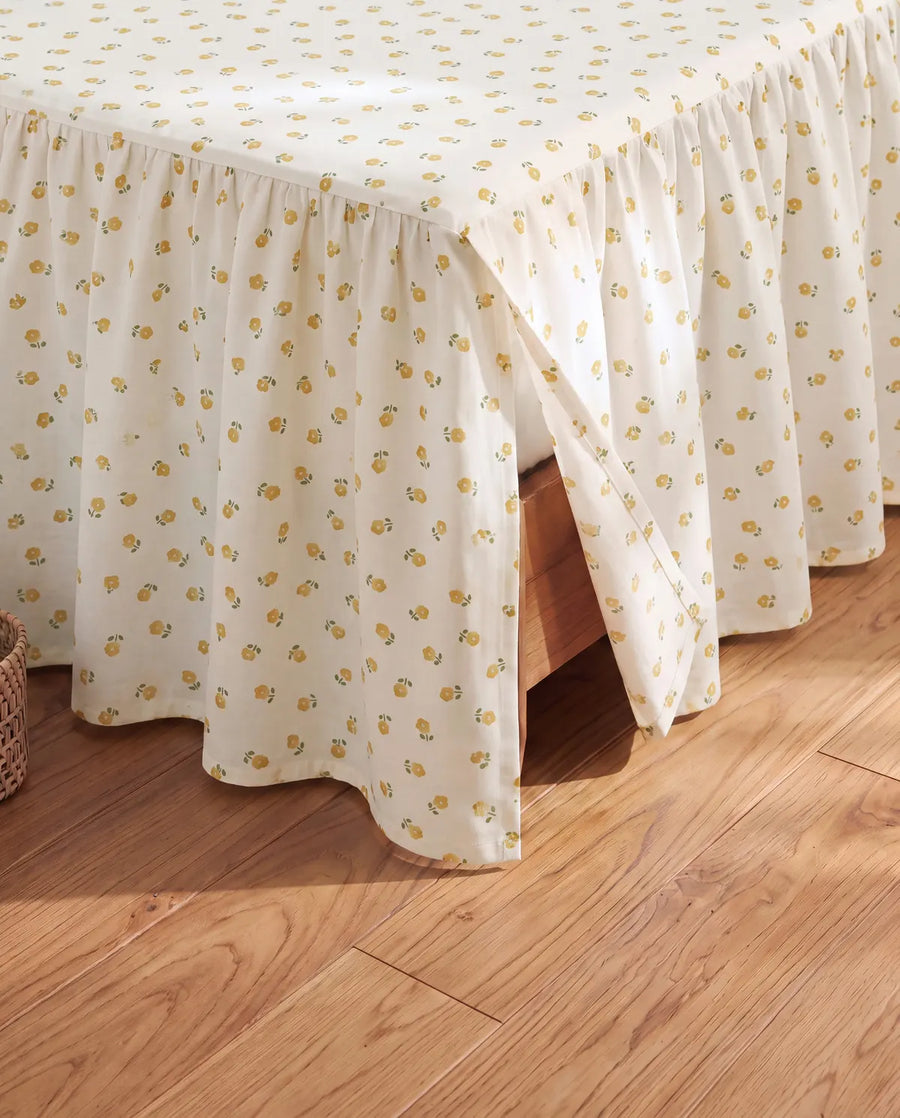golden ditsy floral bed skirt corner slit design