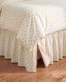golden ditsy floral bed skirt split corner detail