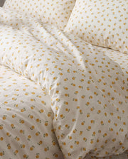 golden ditsy floral comforter set floral pattern closeup
