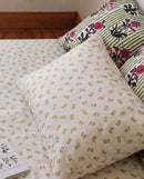 golden ditsy floral pillowcases botanical bedding styling