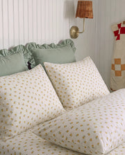 golden ditsy floral pillowcases vintage bedroom decor
