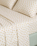 golden ditsy floral sheet set floral pattern closeup