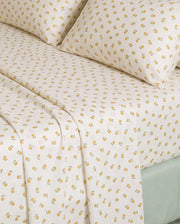 golden ditsy floral sheet set floral pattern closeup