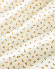 golden ditsy floral shower curtain fabric closeup