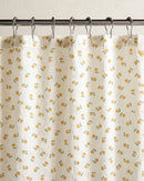 golden ditsy floral shower curtain hanging detail