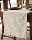 golden ditsy floral table runner draped detail