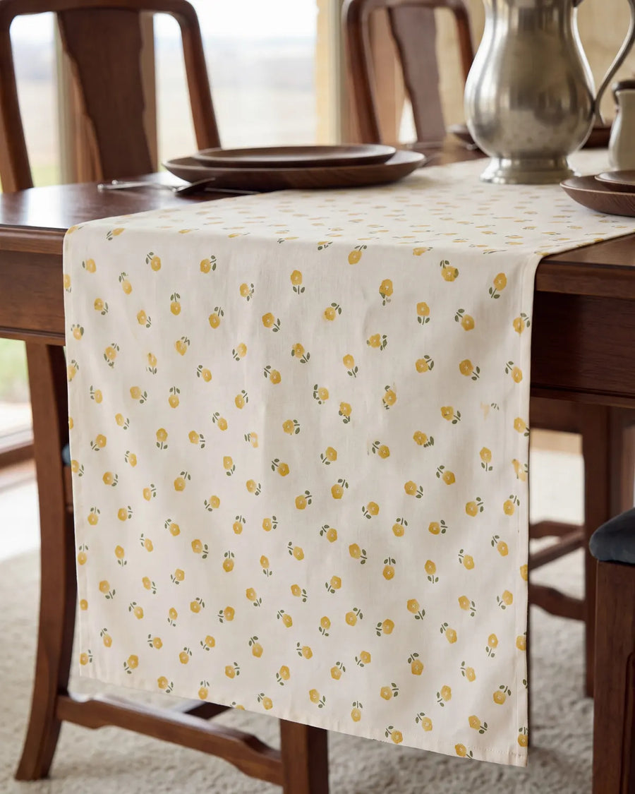 golden ditsy floral table runner draped detail