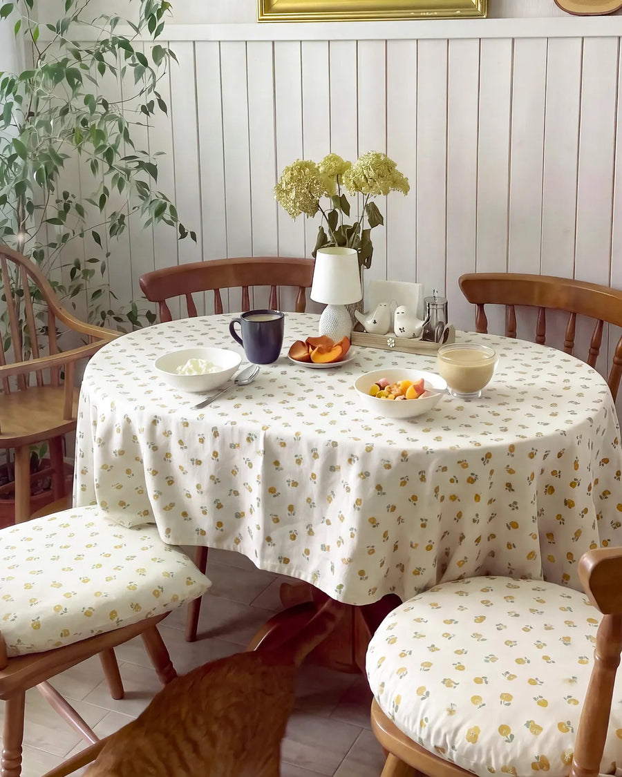 golden ditsy floral tablecloth round dining table