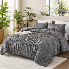 Gray crinkle cotton comforter side layout with white throw