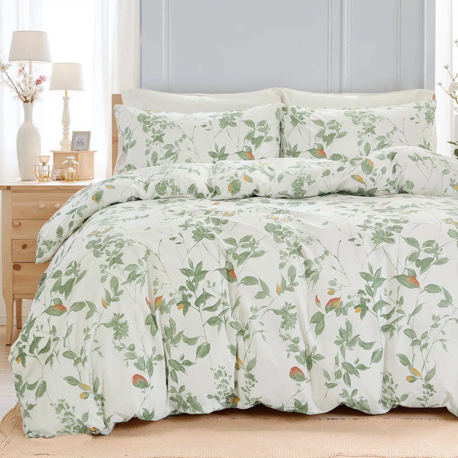 The  green leaf comforter set styled on a bed in a modern, cozy room.