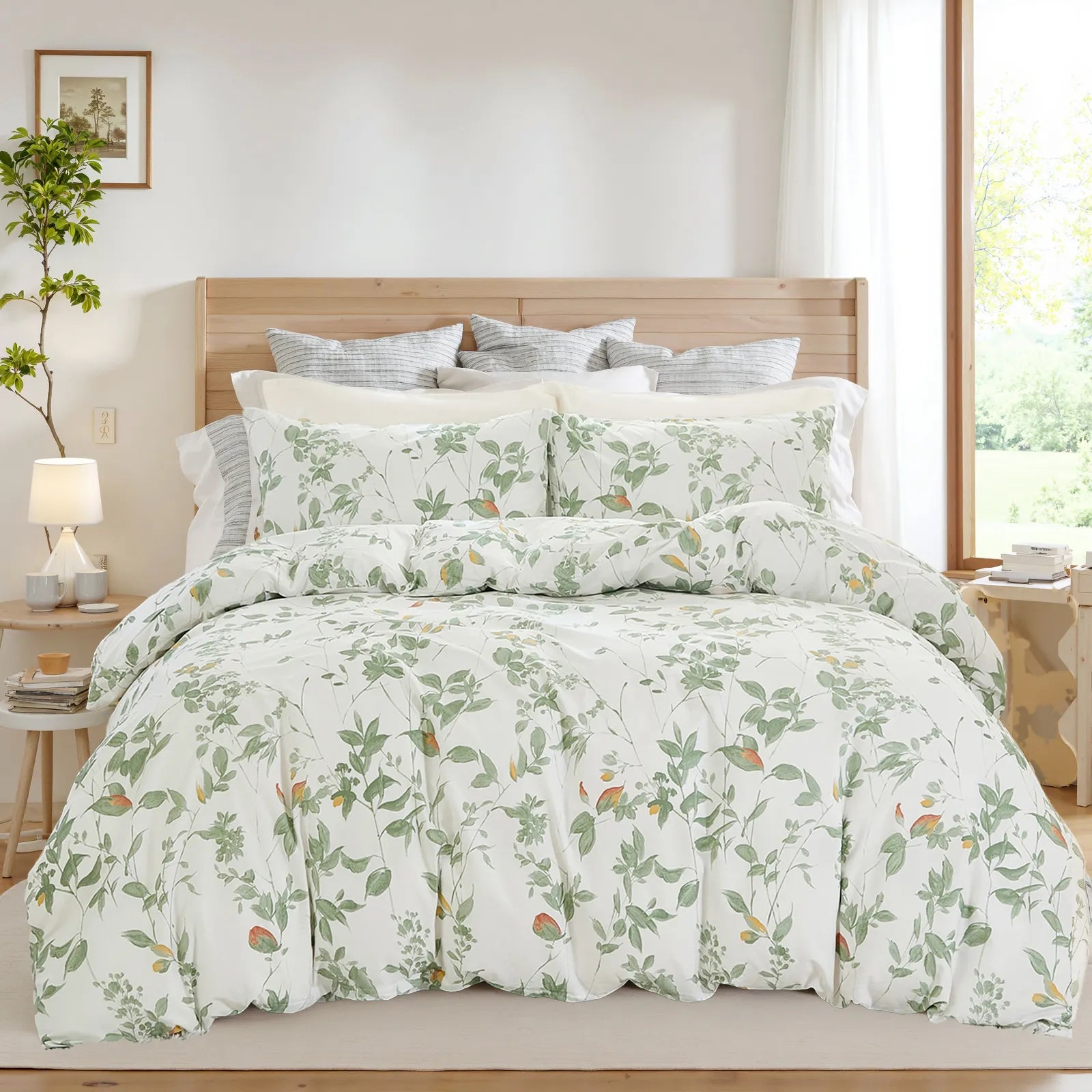 Full scene of the green leaf duvet cover set on a bed in a bright bedroom