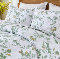 A detailed shot of the matching pillows from the green leaf quilt set
