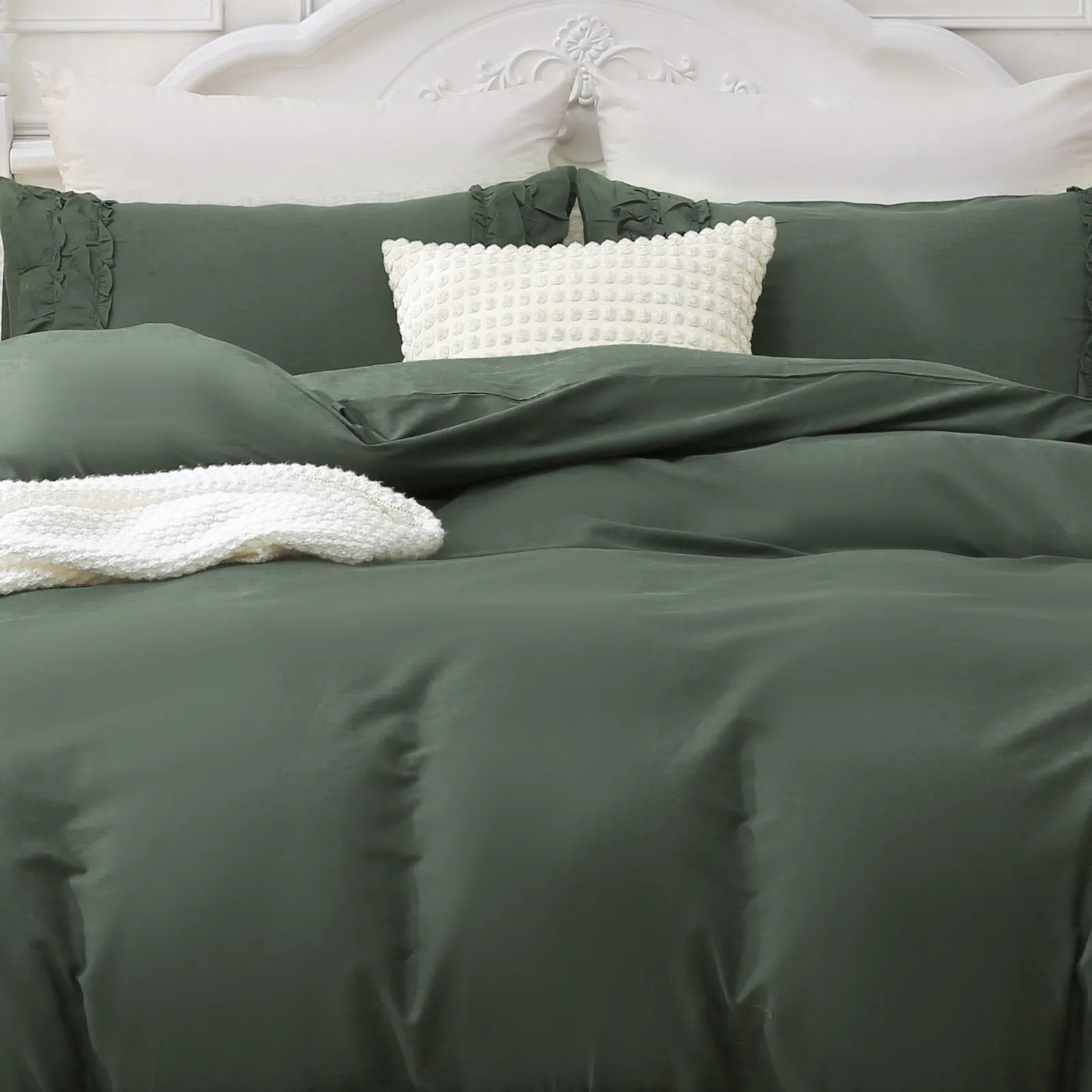 A detailed close-up showing the green soft fabric and ruffled texture