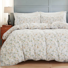 Duvet cover set styled in a cozy bedroom with blue walls