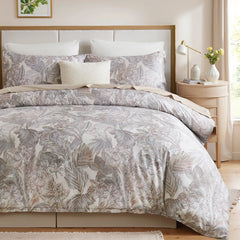 Full view of the grey leaves cotton comforter set on a bed