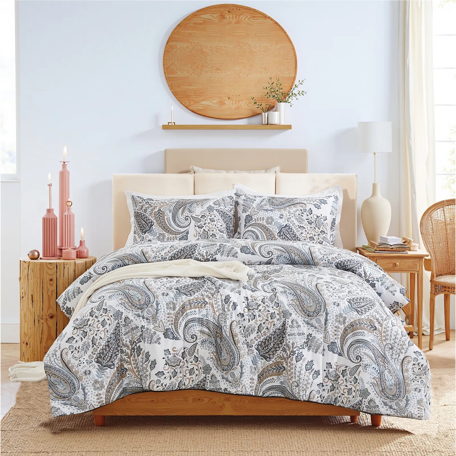 the grey paisley comforter set styled on a bed in a modern bedroom