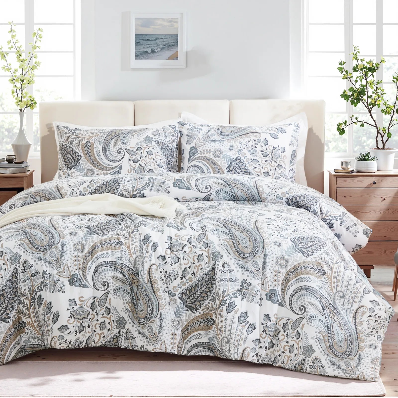 The grey paisley duvet cover set styled in a cozy, modern bedroom