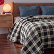 haven plaid yarn dyed quilt midnight haven dark wood floor warm light