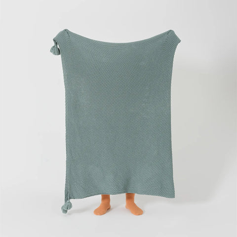 Person Holding Up Aqua Knitted Throw Blanket Full Length Display