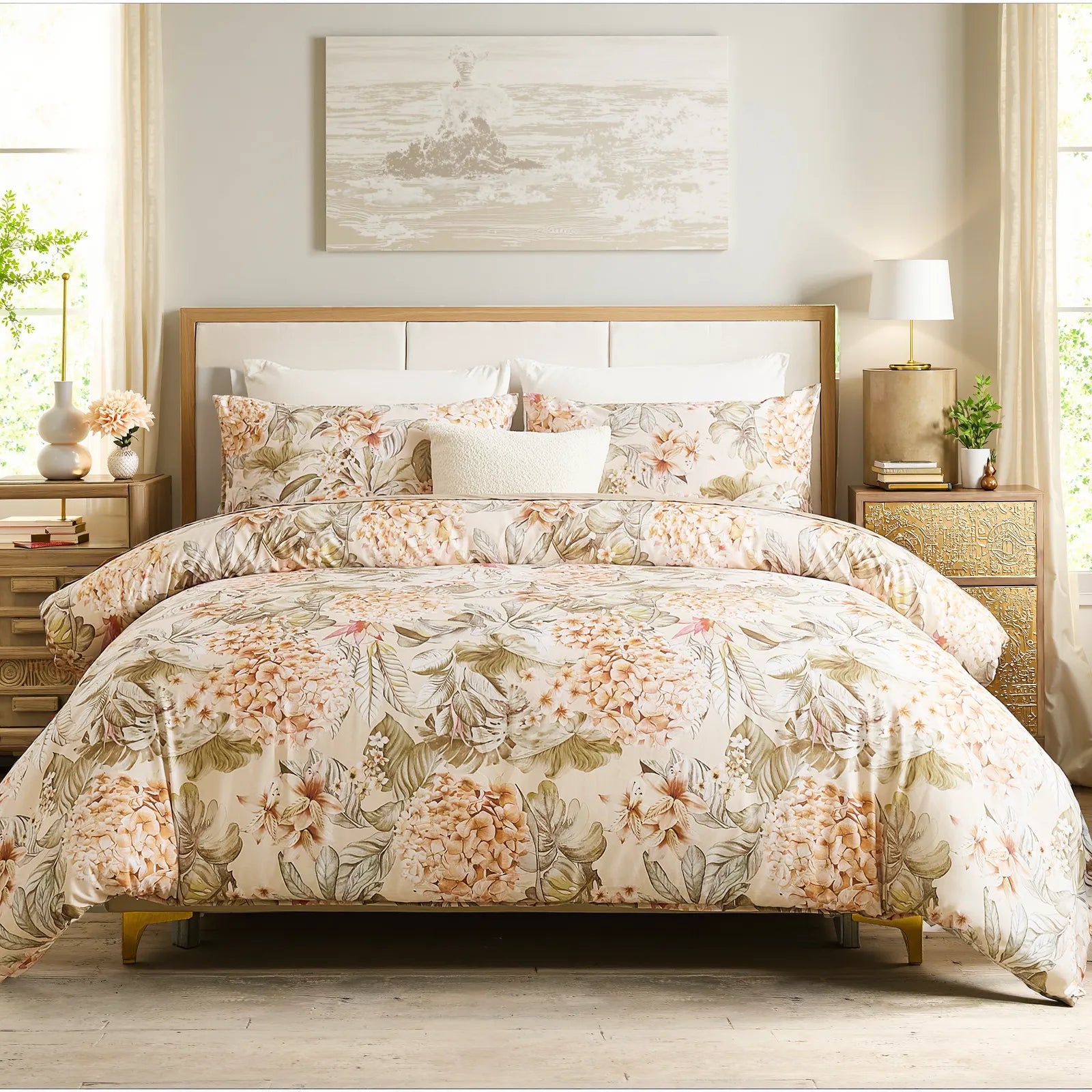 Hydrangea floral duvet cover set spread on bed with soft yellow background