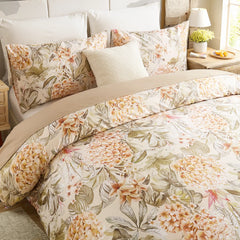 Soft yellow hydrangea duvet cover set on bed
