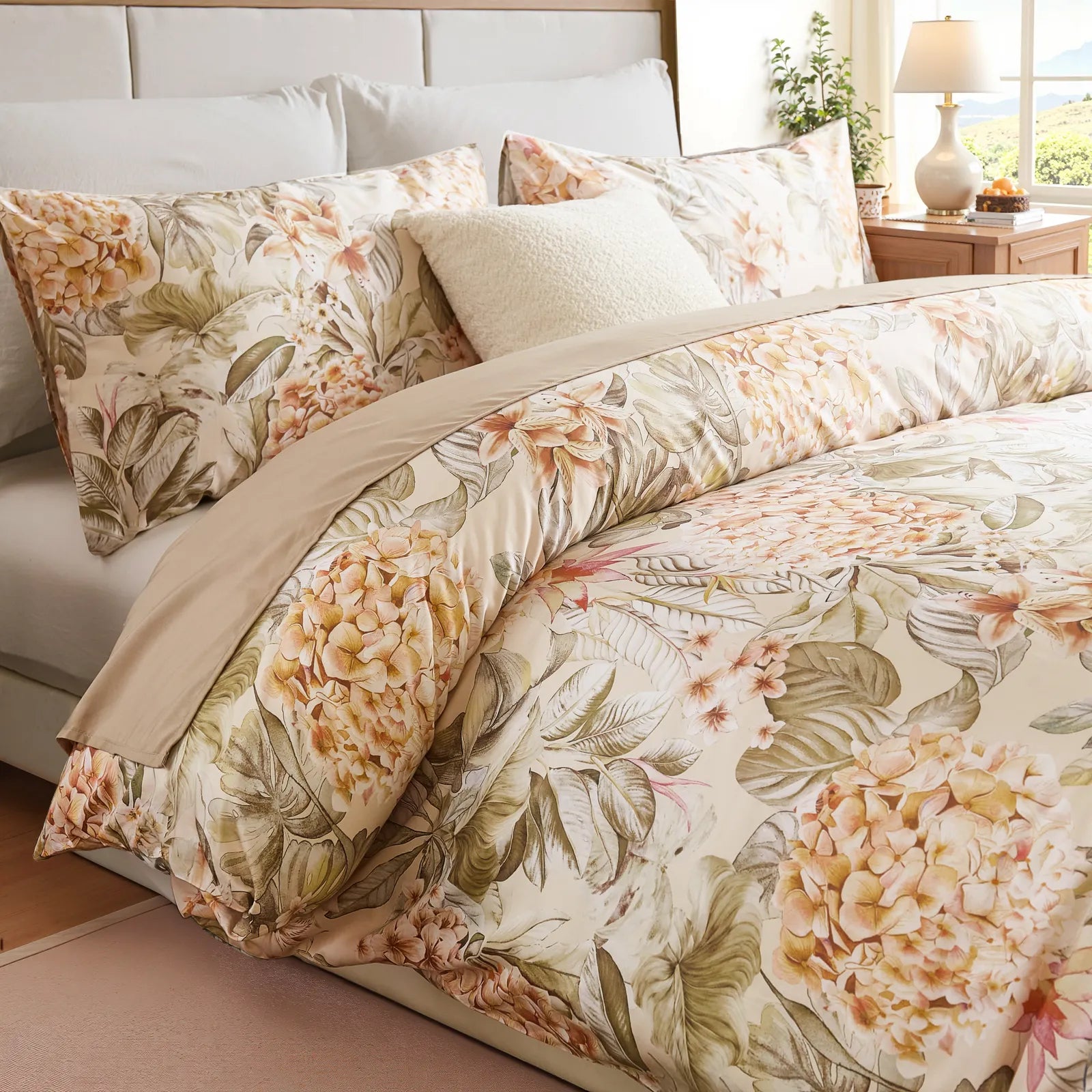 Close-up of the comforter showing the floral and leaf pattern