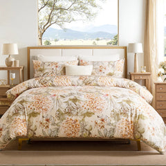 Full view of the hydrangea lily floral comforter set on a bed