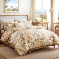 Side view of the floral comforter set on a bed.