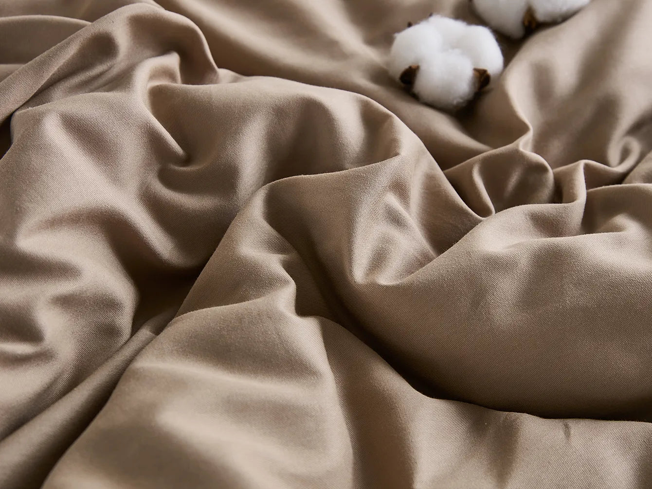 Khaki fabric texture close-up with cotton details