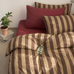 luxury cabana stripe brown duvet cover set with pillows and water bottle
