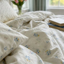 matching botanical pillow shams dainty floral bedspread detail