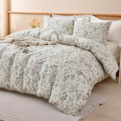 Full view of the meadow floral comforter set styled on a bed in a bright bedroom