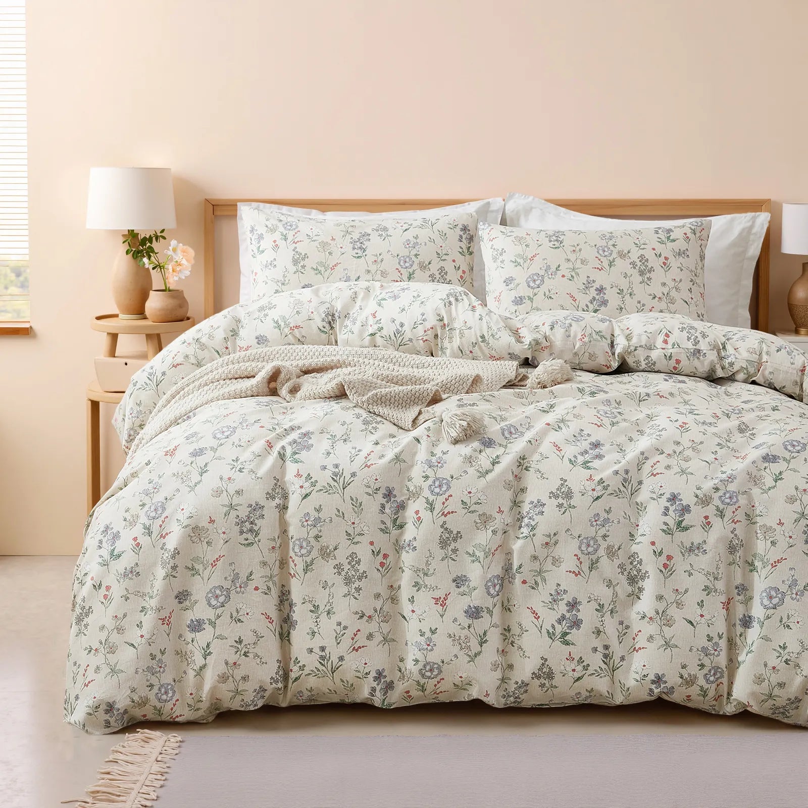 An inviting angled view of the meadow floarl comforter set with matching shams
