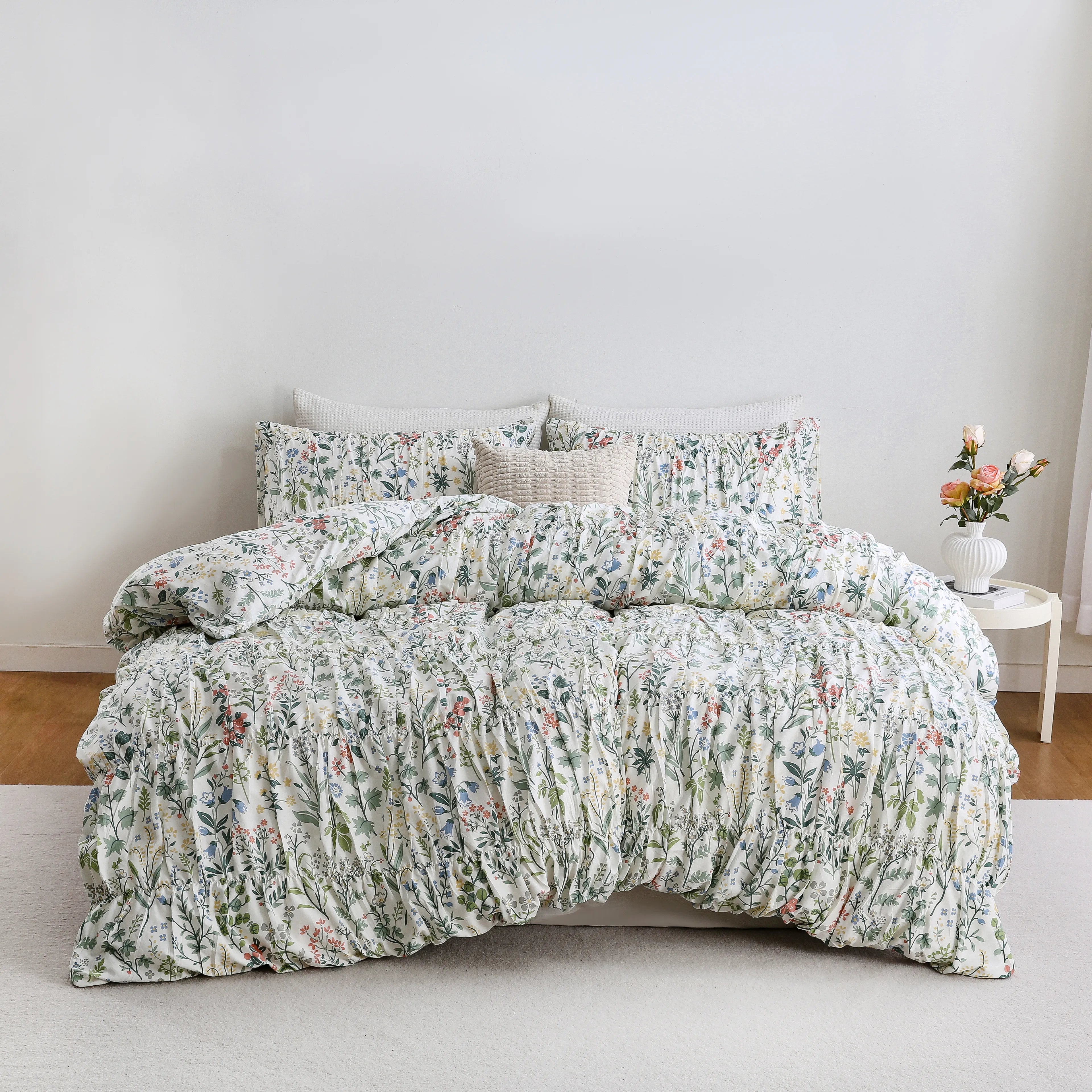 Multicolor floral cotton duvet set front view with four pillows