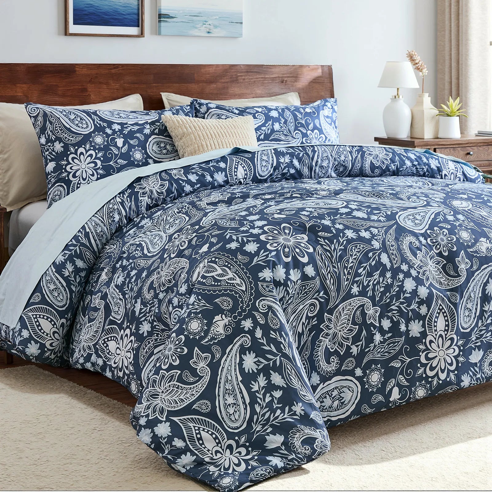 Side angle view of navy paisley comforter