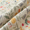 orchard flora washed cotton linen quilt sage green botanical fruit pattern close up
