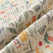 orchard flora washed cotton linen quilt sage green botanical fruit pattern close up