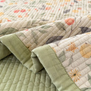 orchard flora washed cotton linen quilt sage green solid reverse border detail