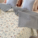 orchard flora washed cotton linen quilt slate blue solid reverse olive leaf print detail
