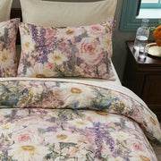 matching oil painting floral pillow shams in moody dark green cotton fabric detail