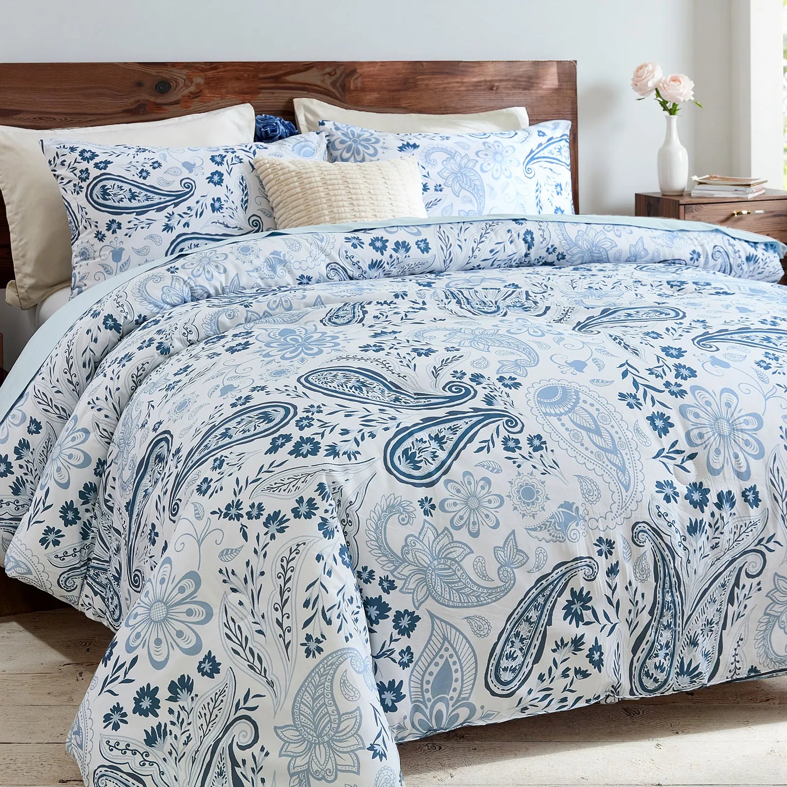 side angle of blue floral cotton comforter
