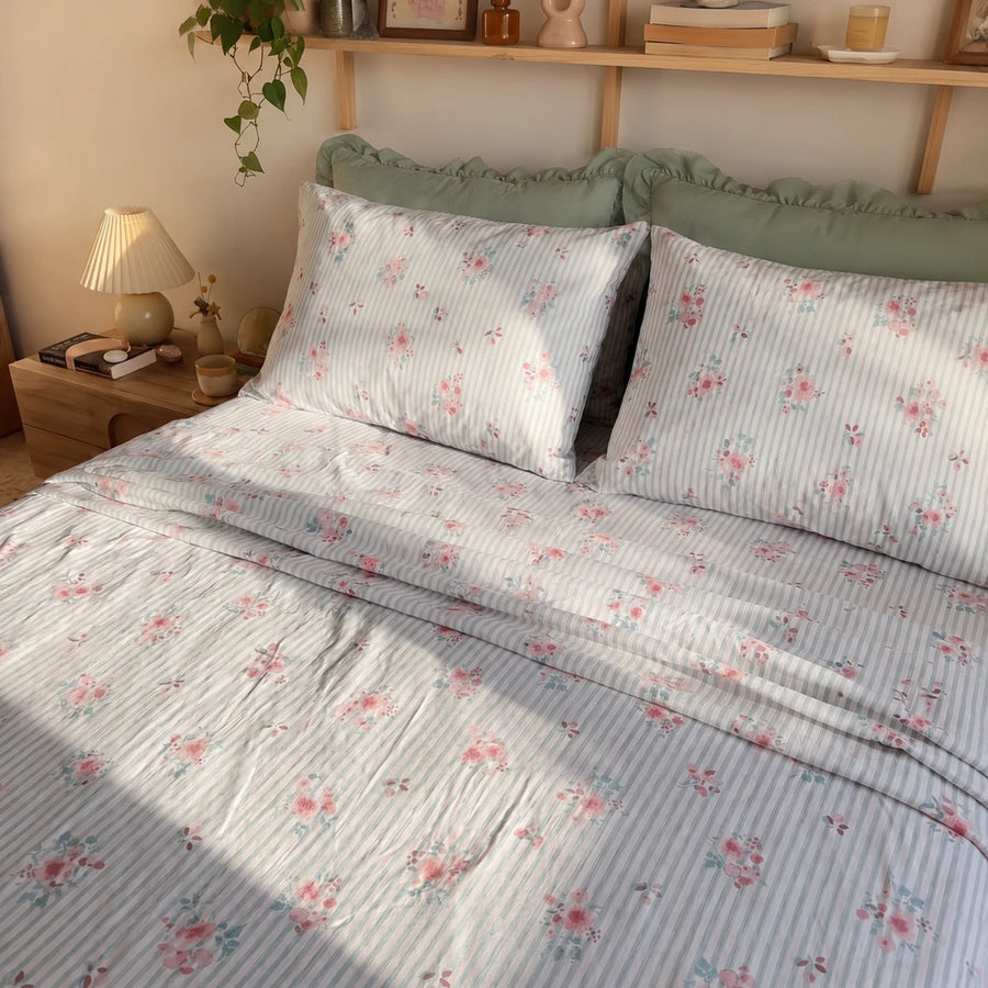 petite bloom pinstripe fitted sheet set warm lighting