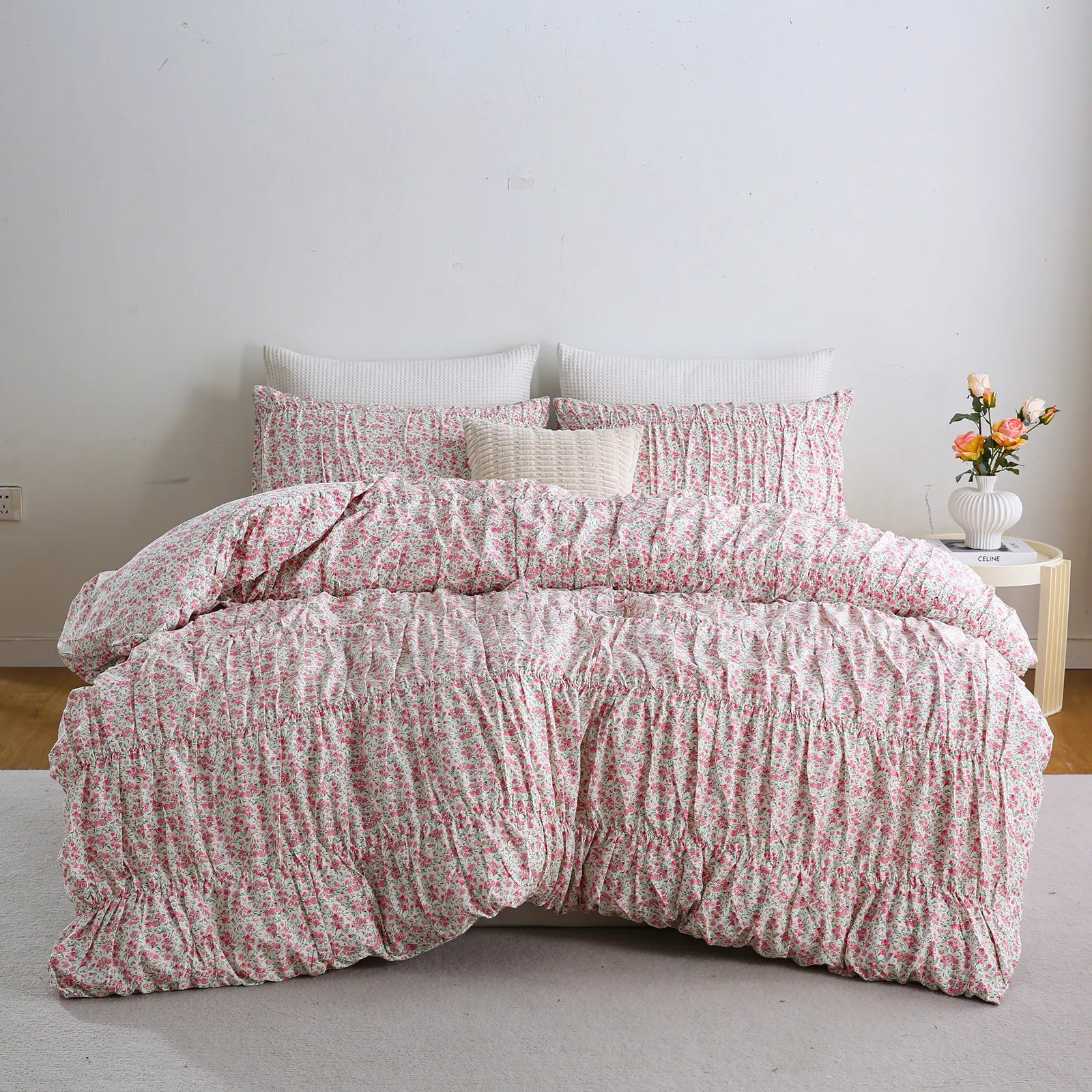 Pink floral cotton duvet set front view with pillows