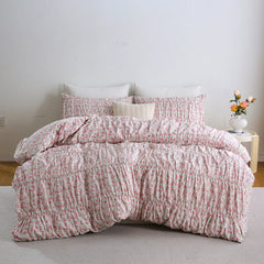 Pink floral cotton duvet set front view with pillows