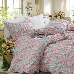 Pink floral cotton duvet set side layout with pillows